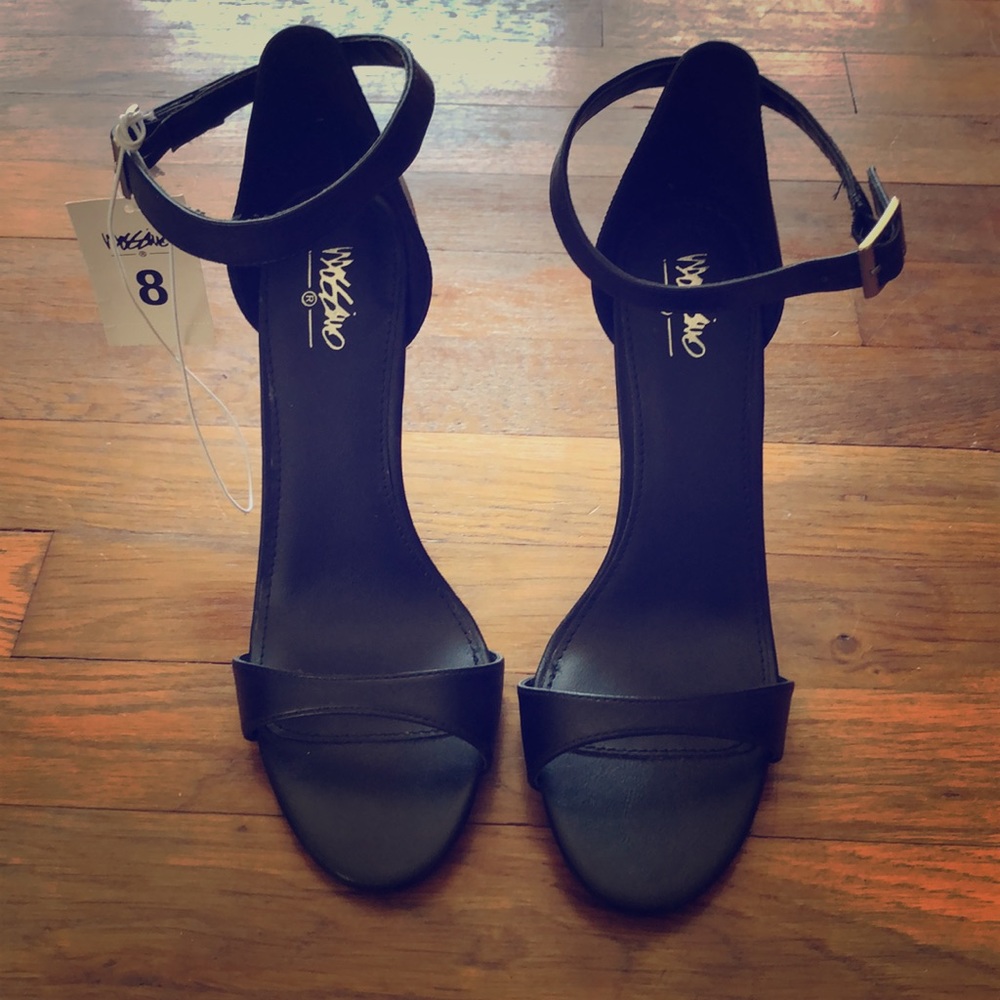 Black high heels, never worn
